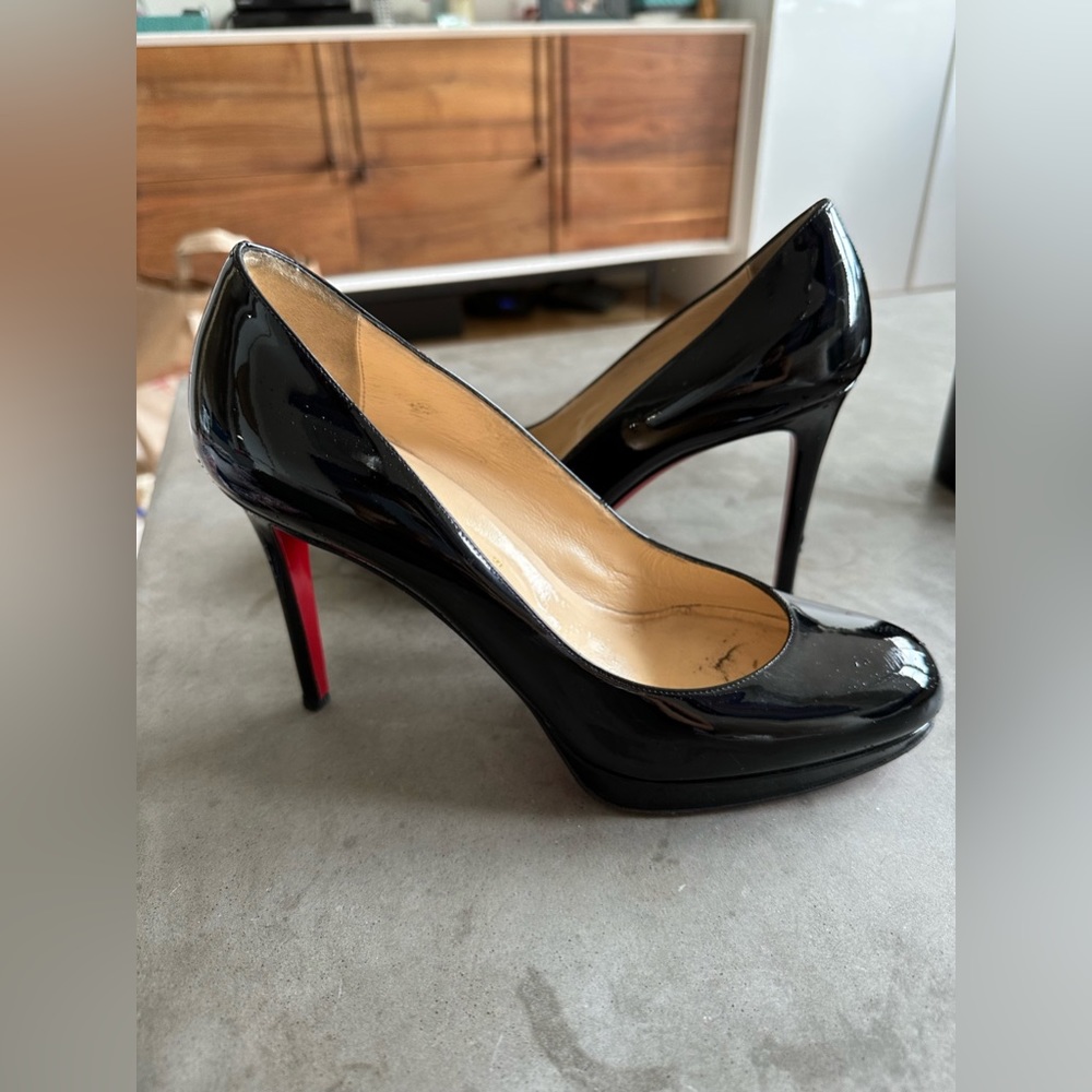 christian louboutin black patent leather heel